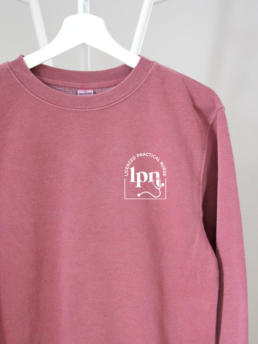 Cred Arch: LPN on Pink sweatshirt