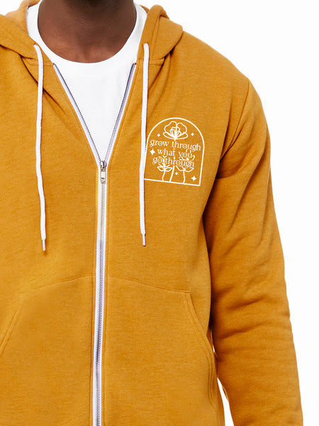 'Grow Through What You Go Through' on Mustard zip up hoodie