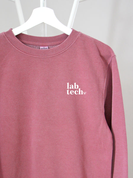 Allied Heart: Lab Tech on pink sweatshirt