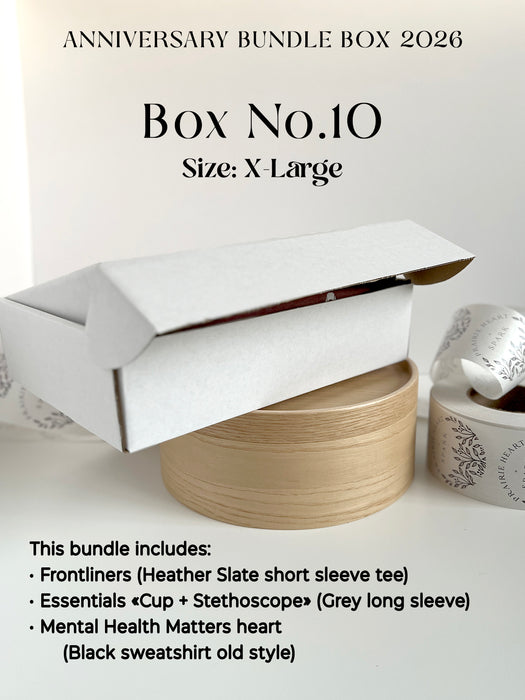 Promotional image of an 'Anniversary Bundle Box 2026' with a large white box on a light background.