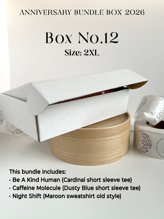 Promotional image of an 'Anniversary Bundle Box 2026' with a white box and text detailing contents.