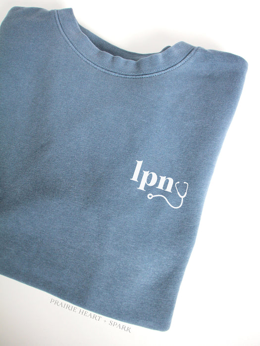 nursescope: Slate blue sweatshirt with "LPN"