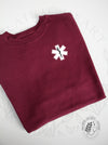 EMS Star: Black colour Rod of Asclepius on a Maroon sweatshirt