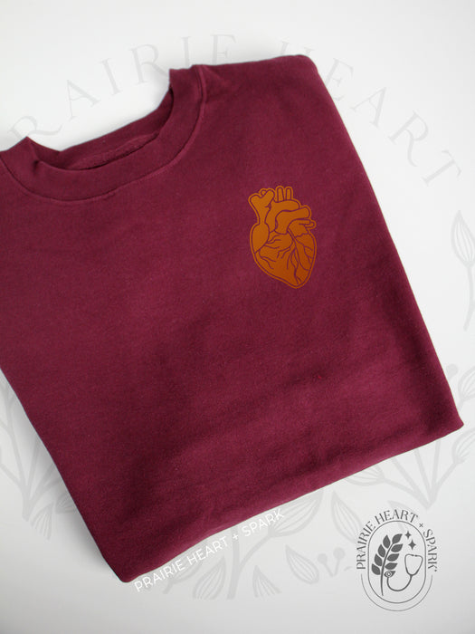 HEART-ology: Maroon sweatshirt with copper heart (mock up)