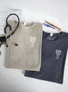 Spooky Heart on Stone & Heather Navy long sleeve shirts.