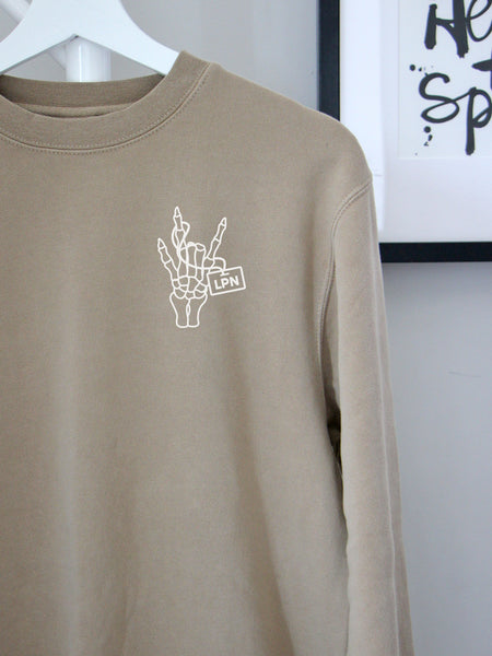 Spooky Rock On with LPN on Sand sweatshirt