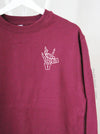 Spooky Rock On with X-Ray Tech on a Maroon sweatshirt