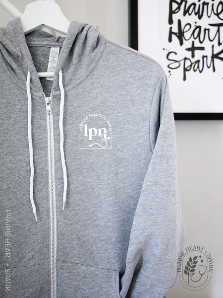 Cred Arch: "LPN" on a Athletic Grey 
zip up hoodie