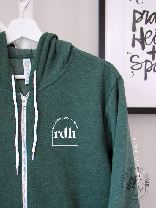Cred Arch: "RDH" on a Heather Forest zip up hoodie