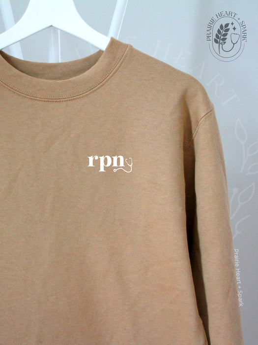 nursescope: Sand sweatshirt with "RPN"
